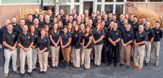 staff CTI People : A group of about 50 CTI employees standing outside of the corporate office