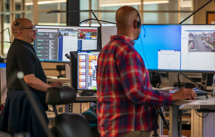 men at workstation