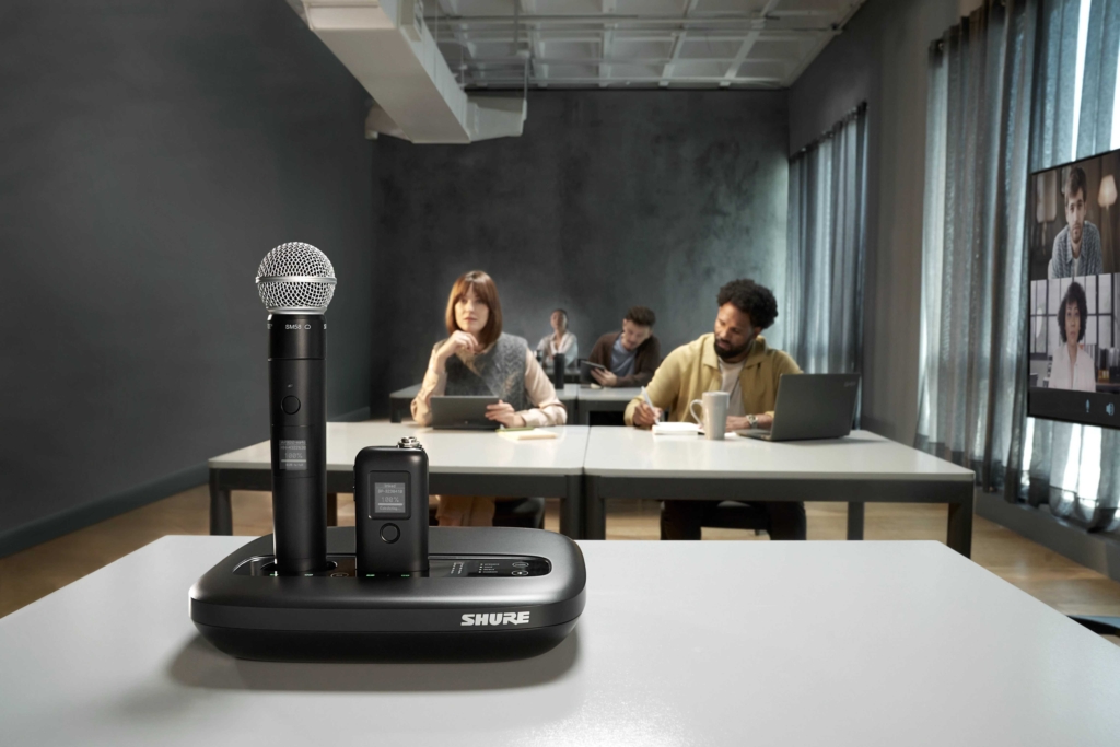 MXW-neXt-2_MXWAPXD2_MXW1X_MXW2X_Audience shure microphone on a table